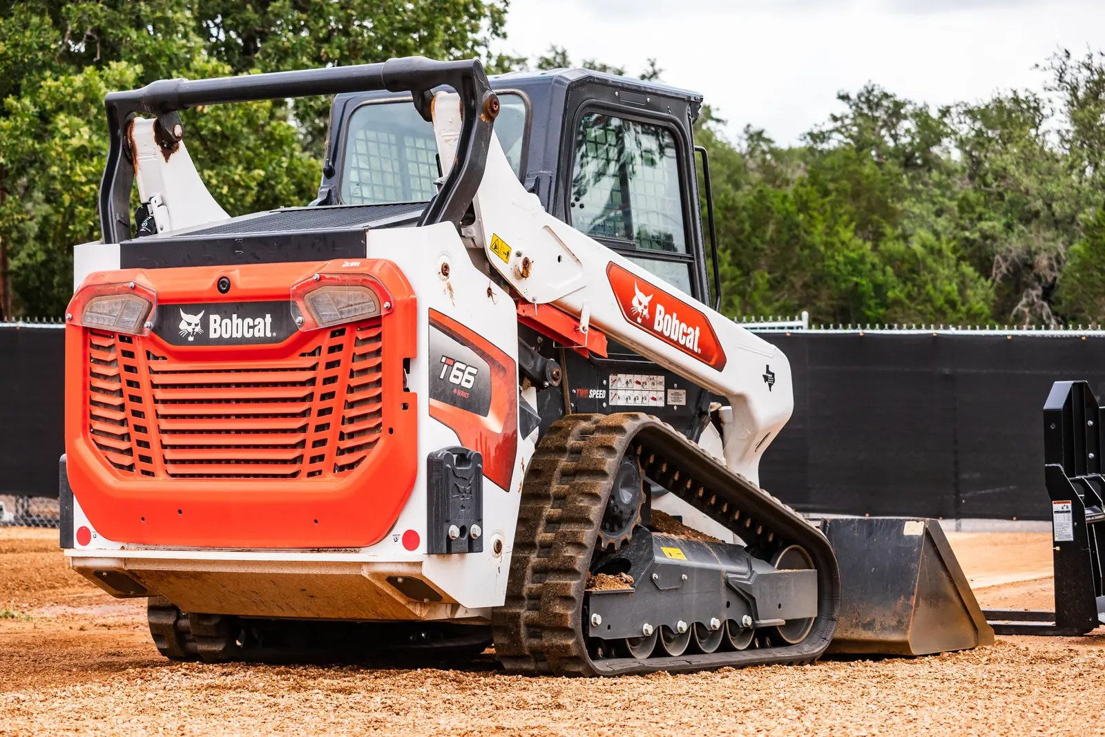 Compact track loader on the job