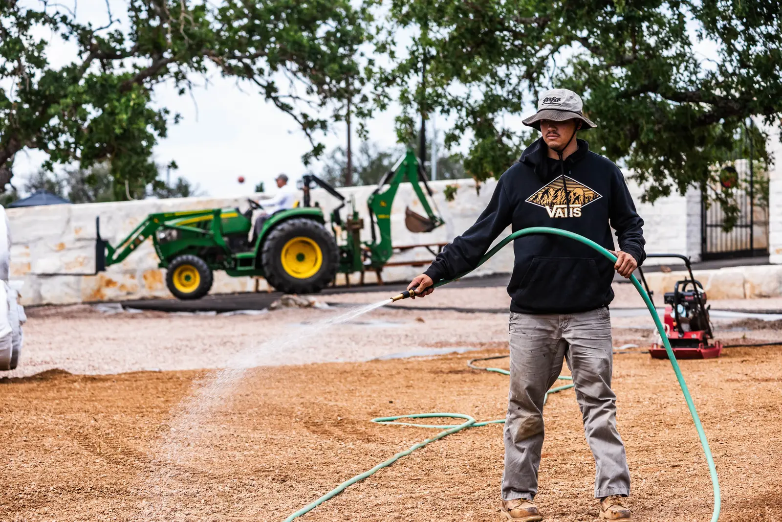 Wetting base before compaction